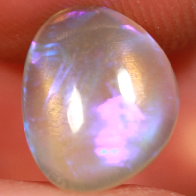 SOLID CRYSTAL OPAL Transparent with purple moving within